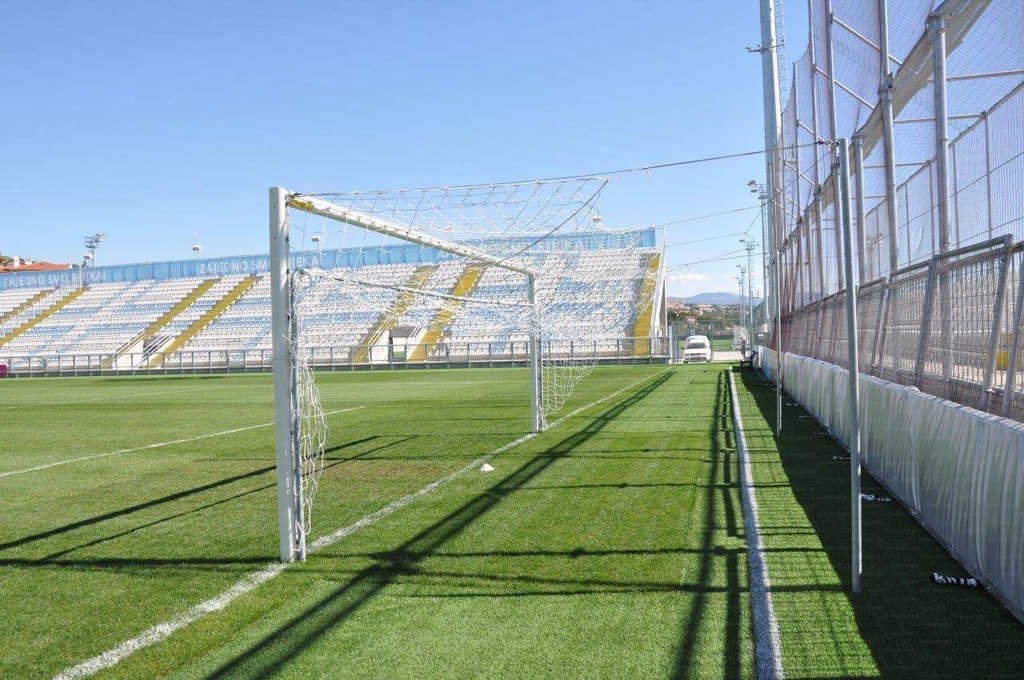 Net support system for full-size football goals